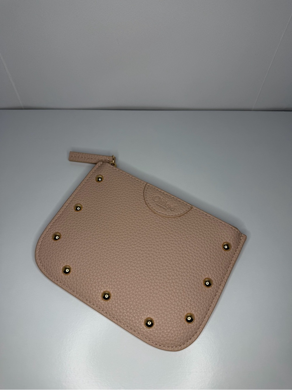 Chloe Studded Pebbled Leather Wristlet in Blush Pink